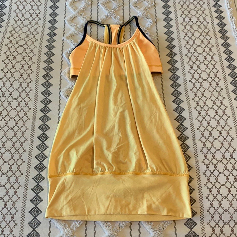 Orange lululemon top with built in bra. Size small